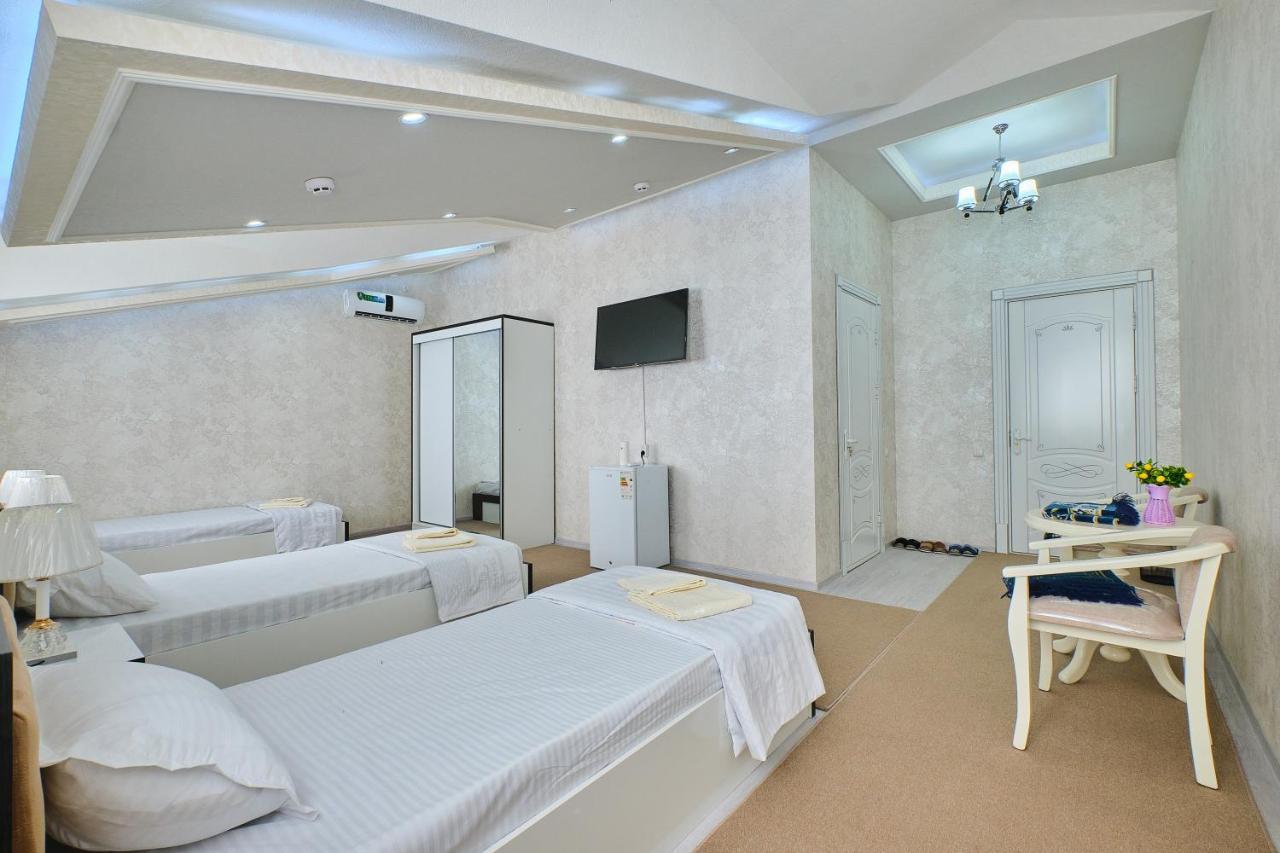 Gunesh Hotel Samarkand Bagian luar foto